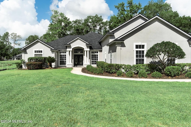 view of front of house with a front lawn