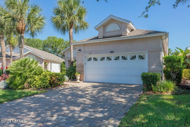 view of front of home with a garage