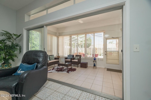 living room featuring light tile patterned flooring and a wealth of natural light