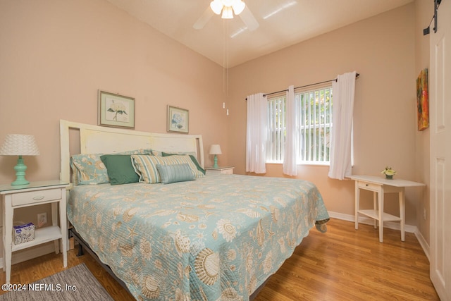 bedroom featuring hardwood / wood-style floors and ceiling fan