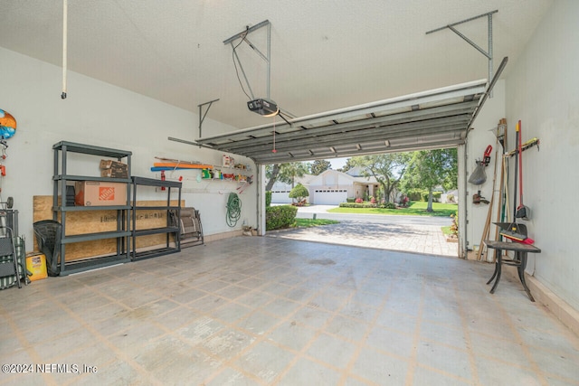 garage featuring a garage door opener