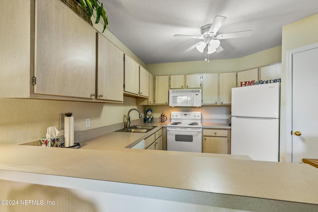 1701 The Greens Way Unit 1224, Jacksonville Beach, FL 32250 - kitchen with kitchen peninsula, a textured ceiling, white appliances, ceiling fan, and sink