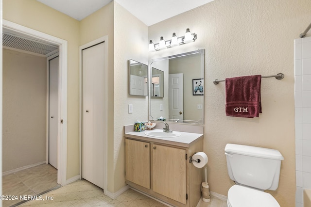 1701 The Greens Way Unit 1224, Jacksonville Beach, FL 32250 - bathroom with vanity and toilet