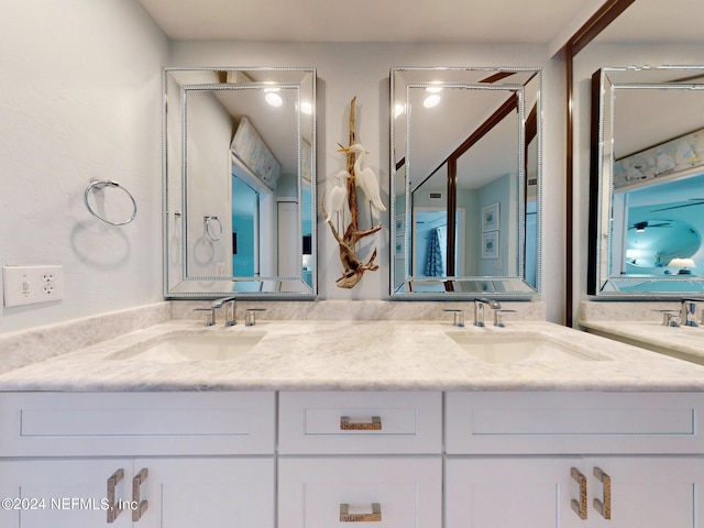 bathroom featuring double sink vanity