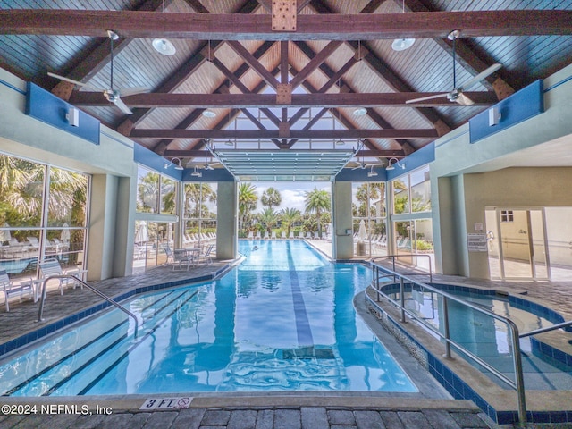 view of swimming pool featuring ceiling fan