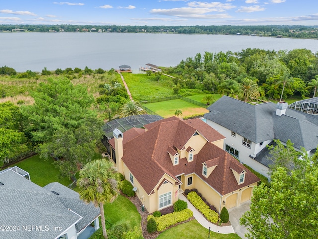 drone / aerial view with a water view