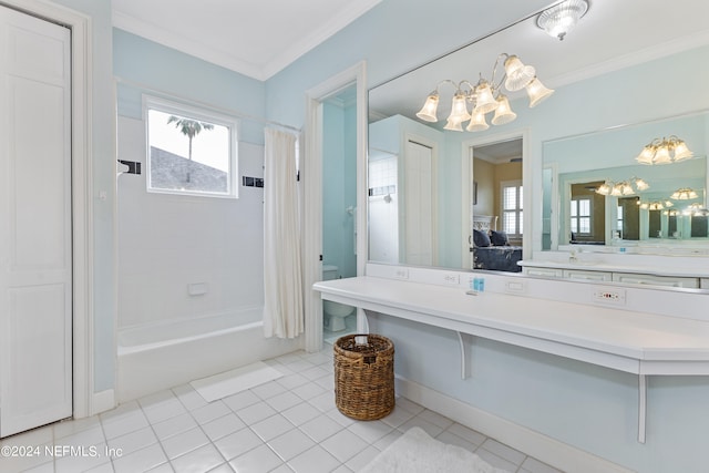 bathroom with tile floors, plenty of natural light, vanity, and shower / bathtub combination with curtain