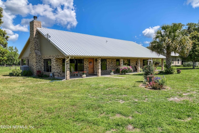 view of front of house with a front yard