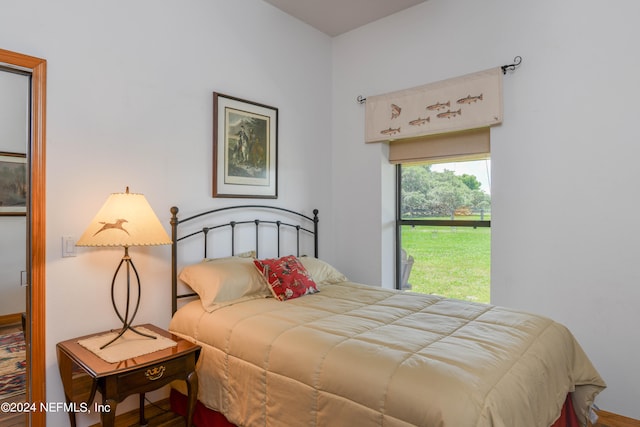 bedroom featuring wood-type flooring