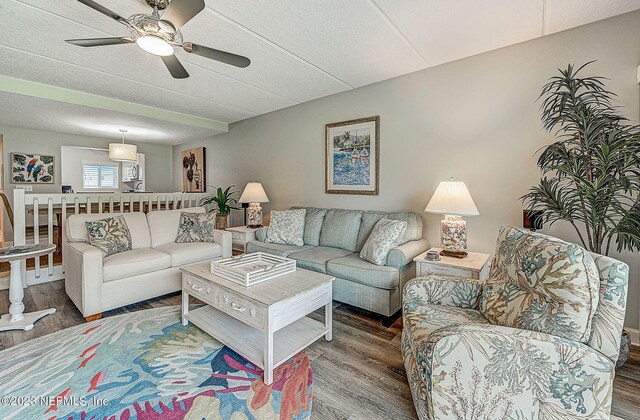 8550 A1A Unit 12122, Saint Augustine, FL 32080 - living room with wood-type flooring, ceiling fan, and a textured ceiling