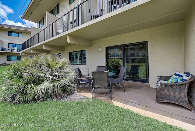 8550 A1A Unit 12122, Saint Augustine, FL 32080 - view of patio / terrace with a balcony