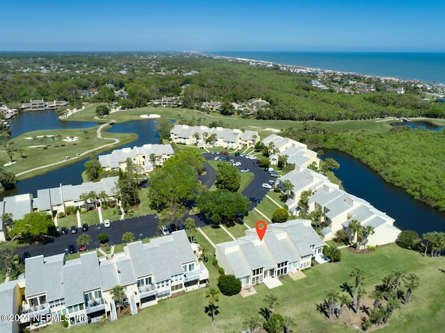 drone / aerial view with a water view