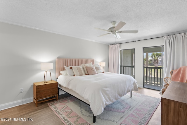 bedroom with ceiling fan, a textured ceiling, access to outside, and light hardwood / wood-style flooring