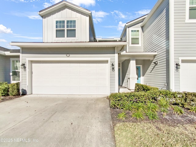 view of front of property with a garage