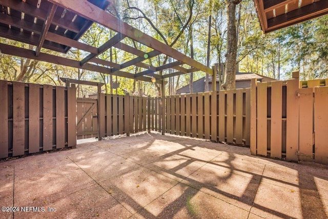 view of terrace with a pergola