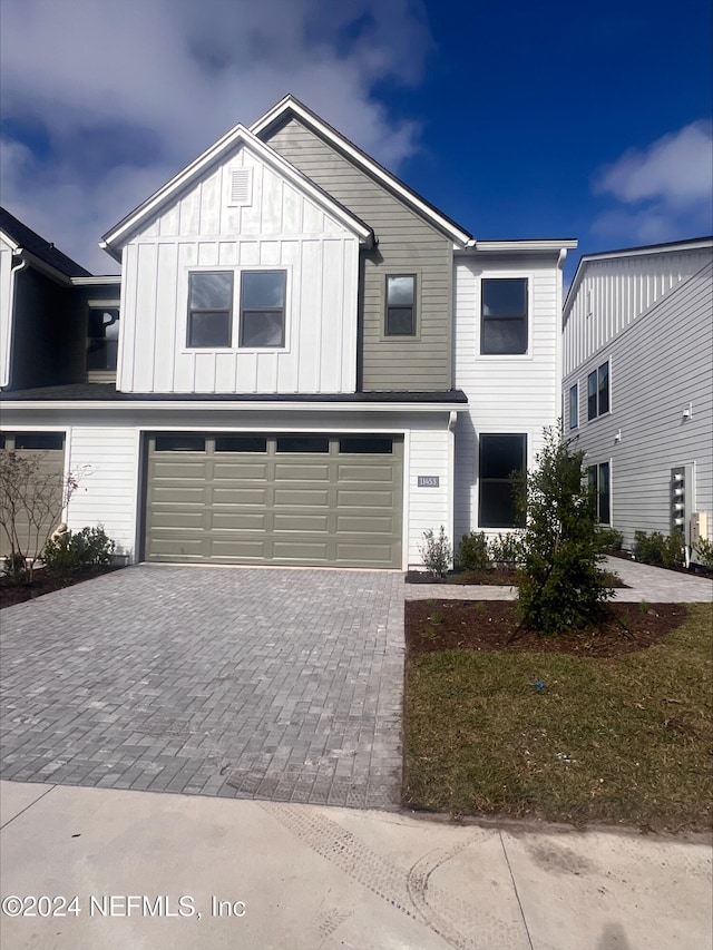 view of front of property with a garage