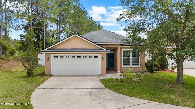 single story home with a front lawn and a garage