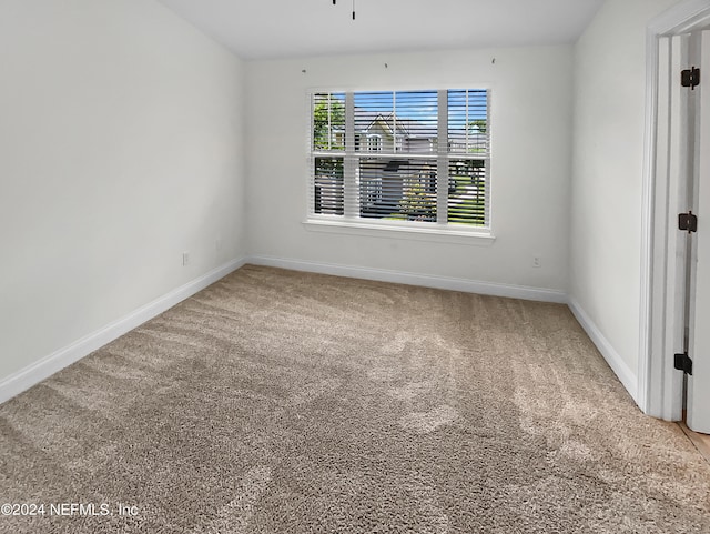 empty room with carpet floors