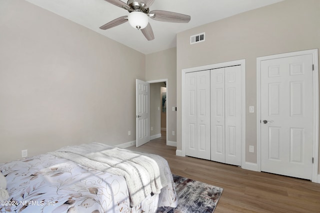 bedroom featuring light hardwood / wood-style flooring and ceiling fan