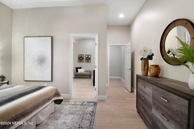 bedroom with light hardwood / wood-style flooring