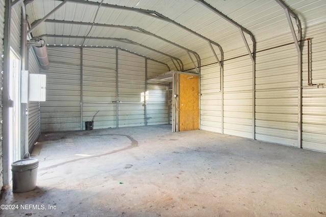 garage featuring a carport