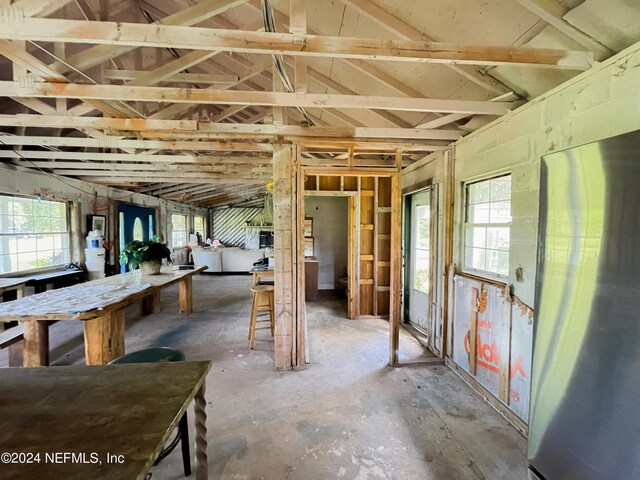 miscellaneous room with plenty of natural light and concrete flooring