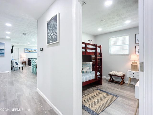 hall featuring light wood-type flooring