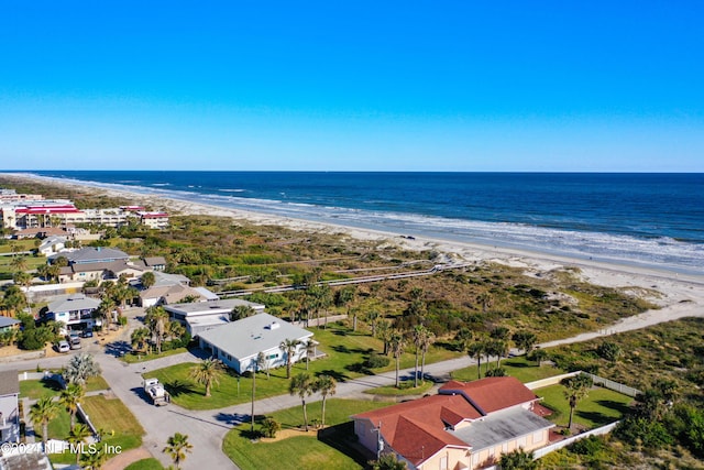 bird's eye view featuring a beach view and a water view