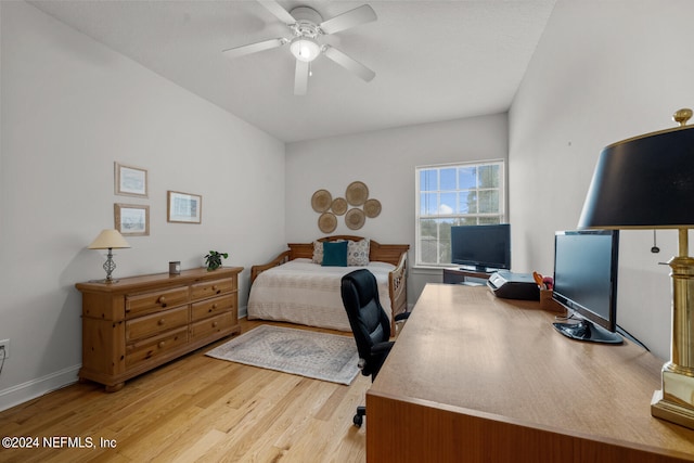 bedroom with ceiling fan and light wood-type flooring