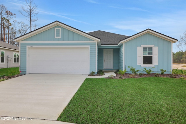 ranch-style house with a garage, concrete driveway, board and batten siding, and a front yard