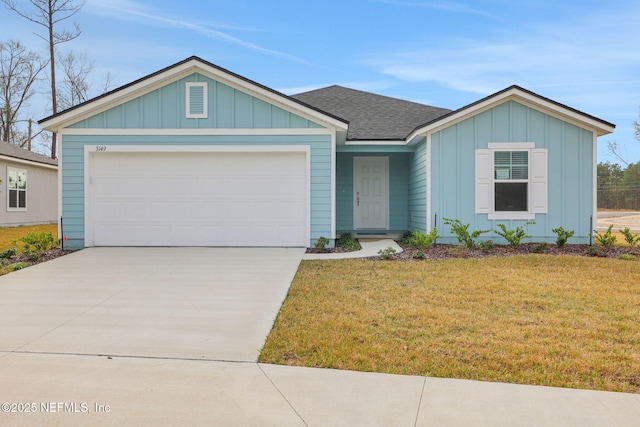 ranch-style home with an attached garage, driveway, board and batten siding, and a front yard