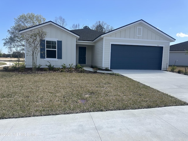 ranch-style home featuring board and batten siding, concrete driveway, a front yard, a shingled roof, and a garage