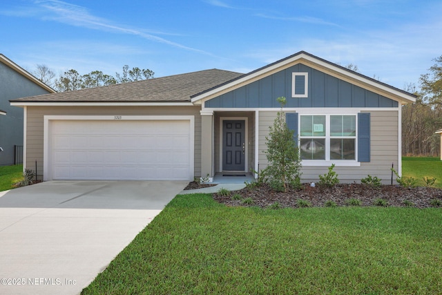 view of front of home with an attached garage, a front lawn, board and batten siding, and driveway