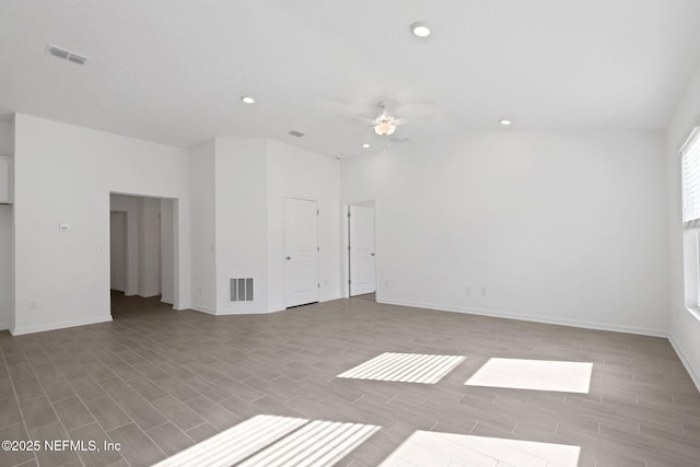 unfurnished room with recessed lighting, visible vents, lofted ceiling, and ceiling fan