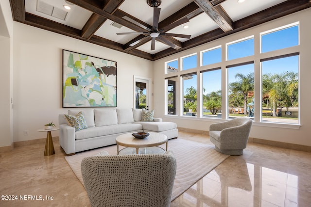 living room with ceiling fan, beam ceiling, and coffered ceiling