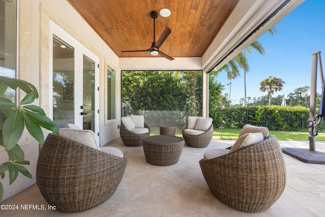 view of patio featuring ceiling fan