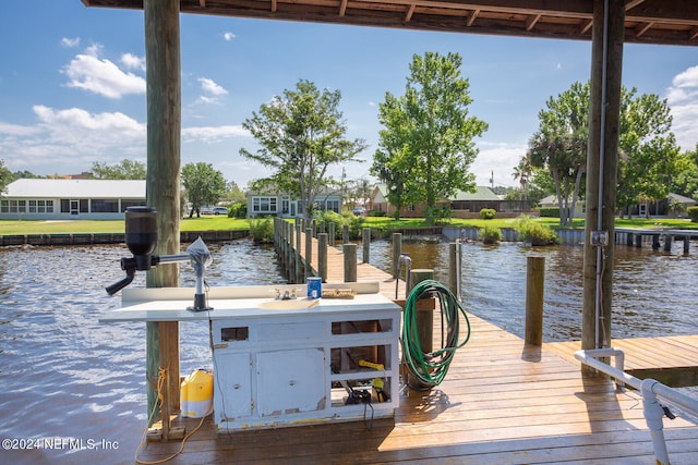 view of dock featuring a water view