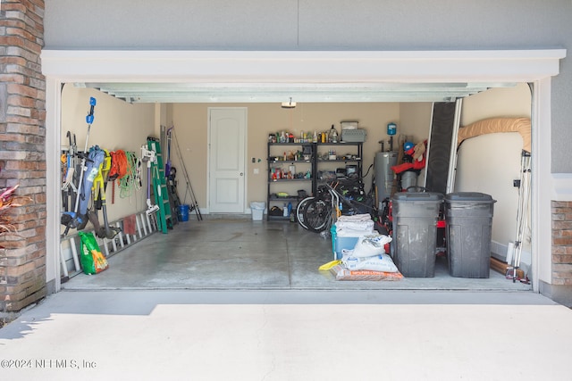 garage featuring gas water heater