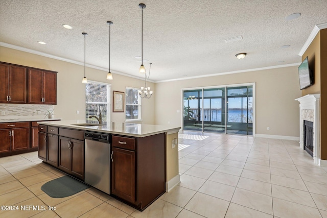 kitchen featuring dishwasher, sink, pendant lighting, a kitchen island with sink, and ornamental molding