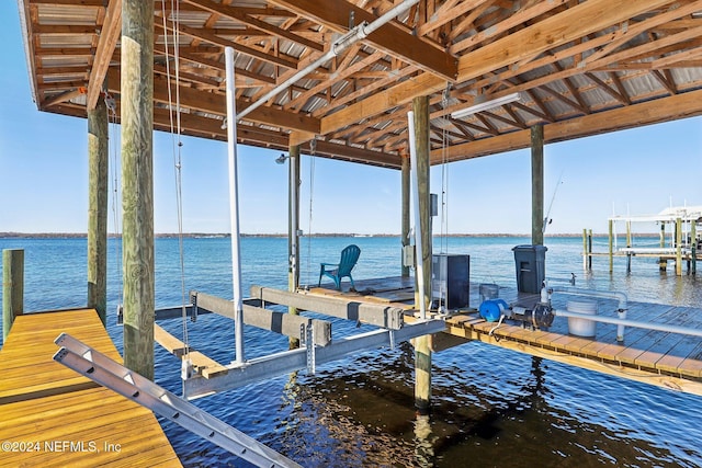 dock area with a water view