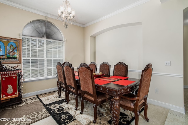 tiled dining space with crown molding and an inviting chandelier