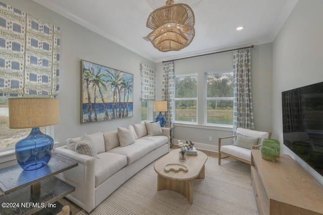 living area with recessed lighting, baseboards, wood finished floors, and ornamental molding