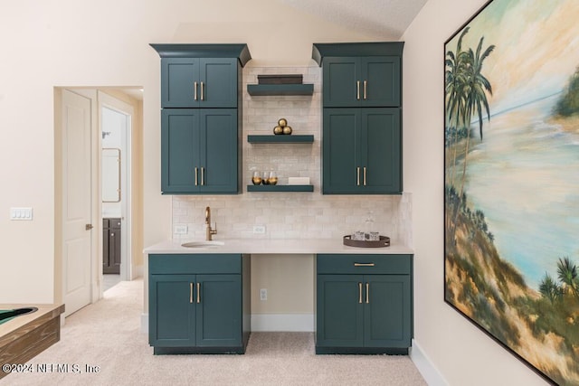 bar featuring backsplash, light carpet, vaulted ceiling, a sink, and baseboards