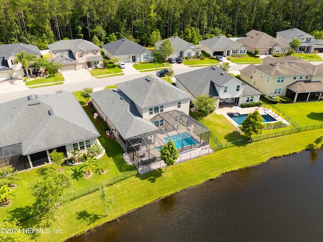 bird's eye view with a water view