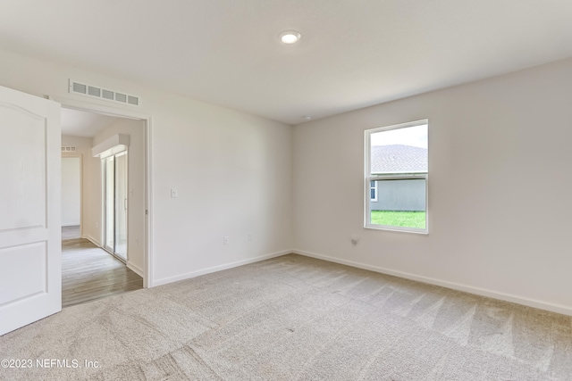 view of carpeted spare room