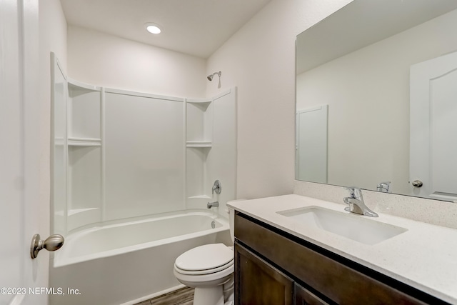 full bathroom featuring wood-type flooring, vanity, toilet, and shower / bathtub combination