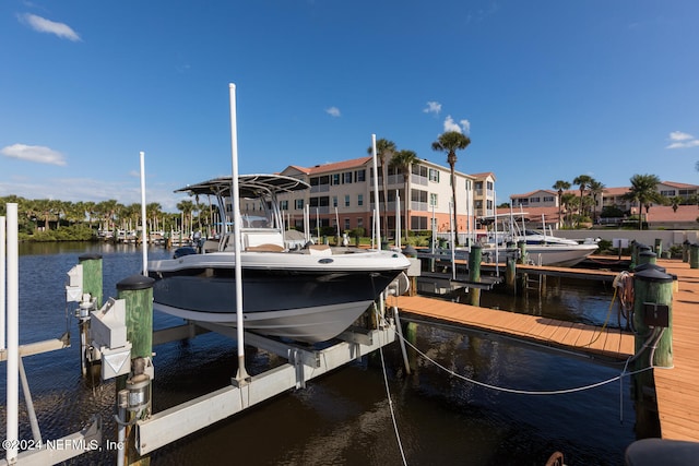 view of dock with a water view