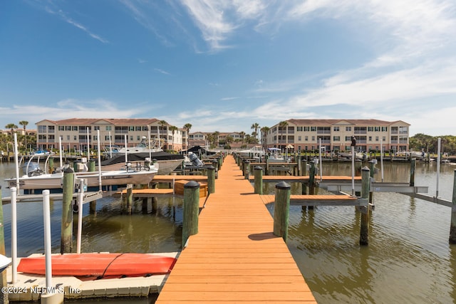 dock area featuring a water view