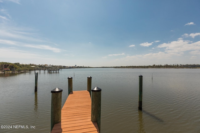 view of dock with a water view