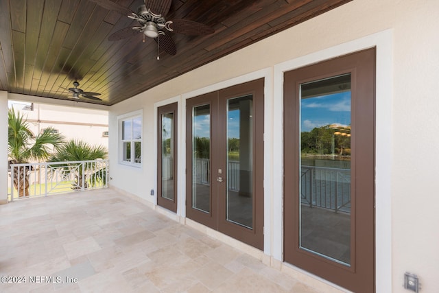 view of patio featuring ceiling fan